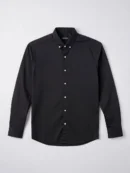 Black long-sleeve dress shirt with white buttons on a light gray background