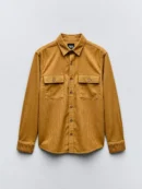 Brown corduroy shirt with two breast pockets and button-down front