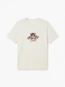 A short sleeve, off-white t-shirt with a brown graphic design on the chest featuring a helmeted figure and 'CHANGE' text.