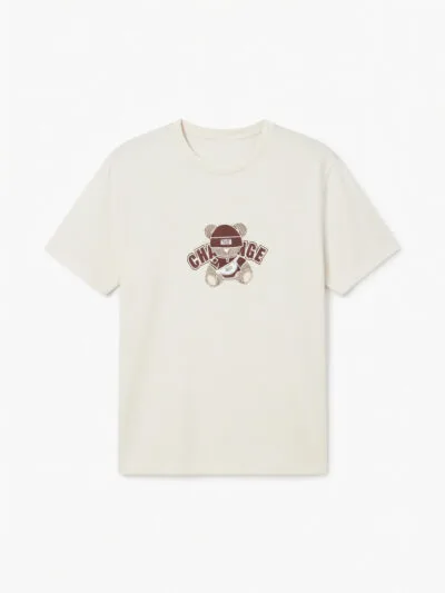 A short sleeve, off-white t-shirt with a brown graphic design on the chest featuring a helmeted figure and 'CHANGE' text.